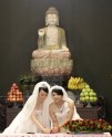 Divas īgavas Taivānā salaulājas budistu ceremonijā - 8