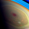 Spinning vortex of Saturn's north polar storm resembles a red rose