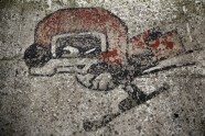 Talismana Vučko zīmējums uz ielas pie bijušās daiļslidošanas arēnas