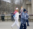 Aleksandrs Matjušenkovs nes Soču olimpisko lāpu