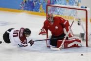 XXII Ziemas olimpiskās spēles, hokejs: Latvija - Šveice - 1