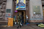 Kijevas protestētāji atbrīvo domes ēku un nojauc barikādes
