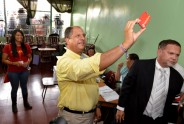 Costa Rican presidential candidate Luis Guillermo Solis takes a selfie