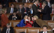 Members of Congress take self photos with a smart phone