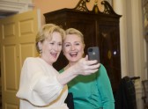 Actress Meryl Streep takes a photo of her and Secretary of State Hillary Clinton