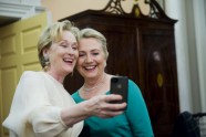 Meryl Streep takes a photo of her and Secretary of State Hillary Clinton