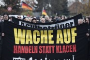 Berlīnē protestē pret bēgļiem  - 1