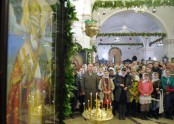 Vladimir Putin attends an Orthodox Christmas 