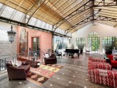 the-gabled-glass-roof-over-the-living-room-rests-on-the-original-steel-structure-the-blinds-dressing-the-glass-roof-open-and-close-automatically