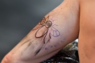 Bites tetovējumi Mančestrā kā solidaritāte - 9