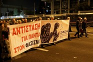 Sacelšanās gadadienā Atēnās protestētāji dodas gājienā uz ASV vēstniecību - 4