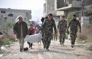 Sīrijas nemiernieki sāk evakuēties - 6