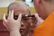 Taizemes alās izglābtos puišus iesvēta budistu ceremonijā - 20