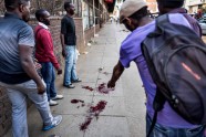 Karavīri vēršas pret protestētājiem Hararē 01.08.2018 - 7