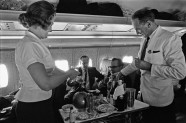 BOAC Steward and Stewardess serving drinks during a proving flight between Heathrow and Khartoum. 1st February 1964-7