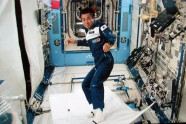 Astronaut demonstrating a "magical flying carpet"