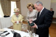 Britain s Queen Elizabeth II and Irish President Mary McAllese