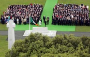 Britain s Queen Elizabeth and Ireland s President Mary McAleese take part in a wreath laying ceremony at the Irish War Memorial Garden